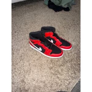 Nike Air Jordan 1 Mid sneakers in a black, gym red, and white size 10